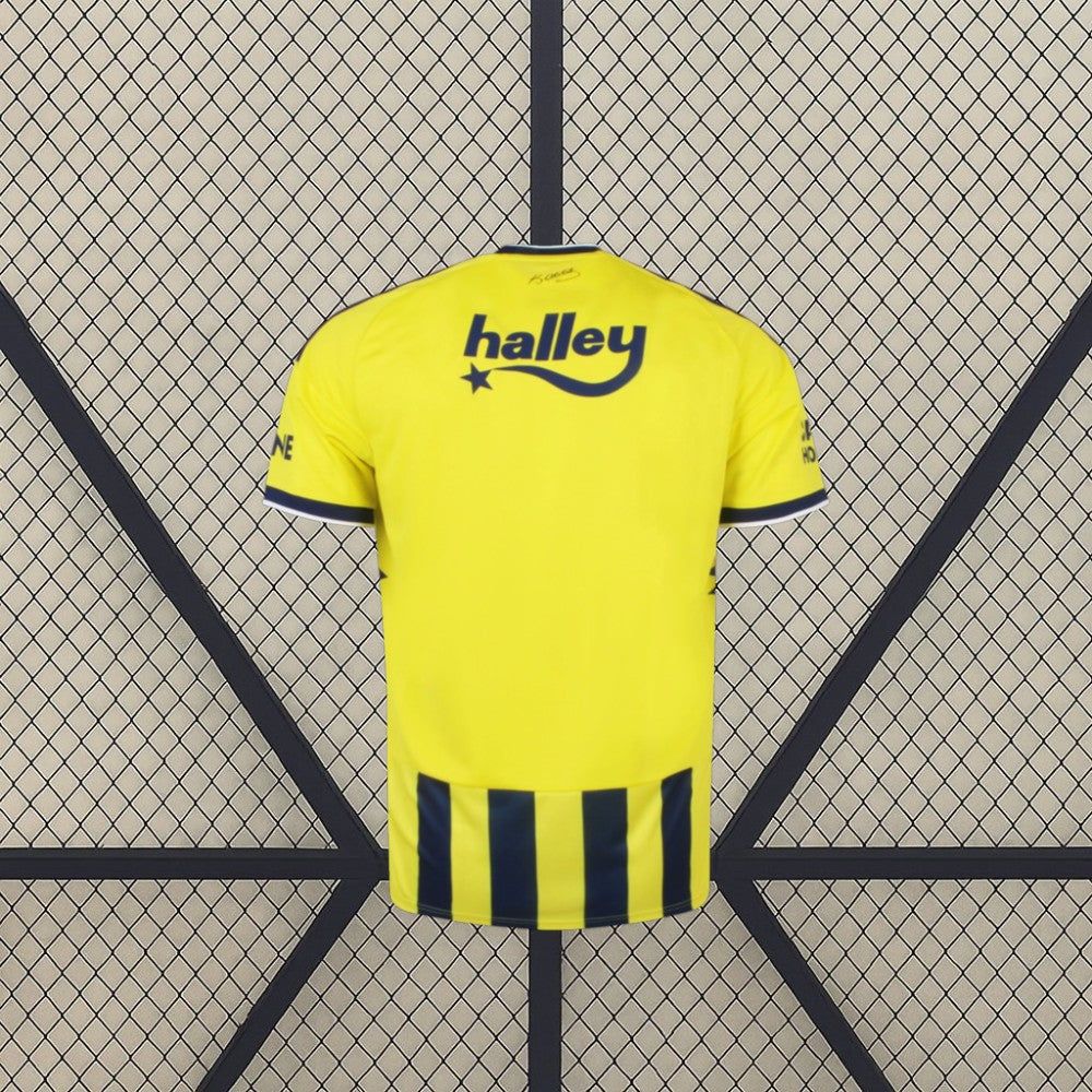 Camiseta Fenerbahçe 26-27 local vista trasera en amarillo con detalles azul marino en mangas y franjas en la zona inferior