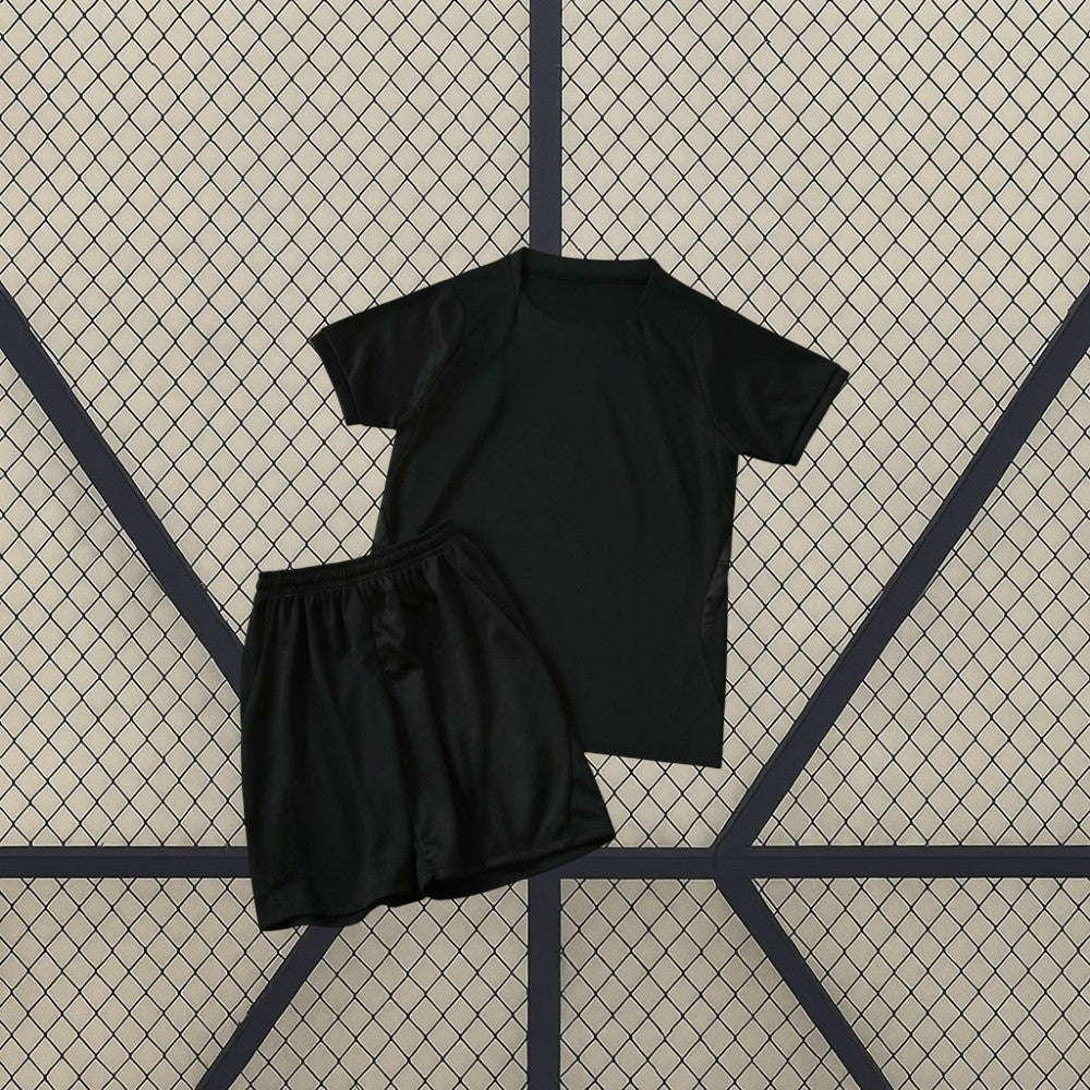Conjunto infantil Noruega visitante 26-27 con camiseta gris oscura y pantalón a juego