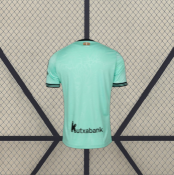 Camiseta Alavés 26-27 tercera equipación vista trasera en verde agua con mangas cortas y ribetes negros