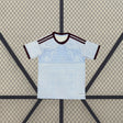 Camiseta Aston Villa 26-27 tercera equipación vista frontal en azul celeste con patrón ornamental tonal, cuello granate y detalles claros en hombros