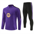 Chándal Barcelona 26-27 Modelo 4 con sudadera morada de media cremallera y pantalón negro con detalle lateral morado