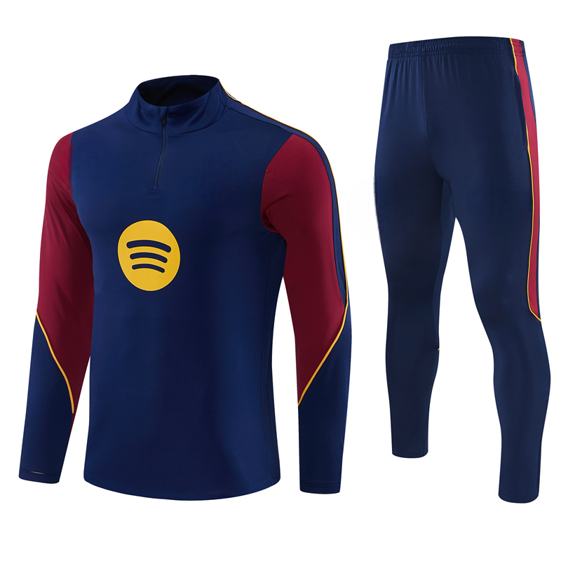 Chándal Barcelona 26-27 Modelo 5 con sudadera azul marino de media cremallera y pantalón azul con detalles laterales granates y amarillos