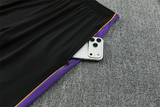 Detalle del bolsillo lateral con cremallera del pantalón negro del chándal Barcelona 26-27 Modelo 2