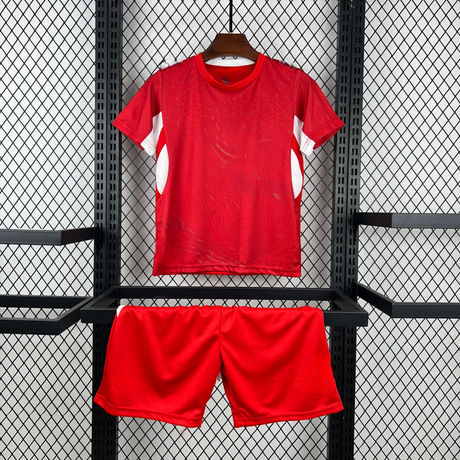 Equipación Suiza 26-27 Local de niño con camiseta roja y pantalón corto rojo para el Mundial 2026