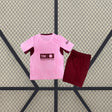 Equipación Valencia 26-27 tercera equipación infantil con camiseta rosa claro de manga corta y pantalón corto granate