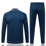 Parte trasera del chándal Italia 26-27 Modelo 1 en color azul marino con pantalón largo a juego