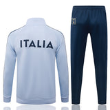 Parte trasera del chándal Italia 26-27 Modelo 2 con texto ITALIA en la espalda y pantalón azul marino