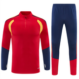 Vista frontal completa del Chándal España 26-27 Modelo 3 con chaqueta roja de media cremallera y pantalón a juego