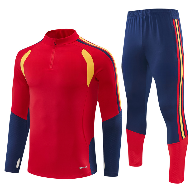 Vista frontal del Chándal España 26-27 media cremallera Modelo 3 con chaqueta roja y pantalón azul marino