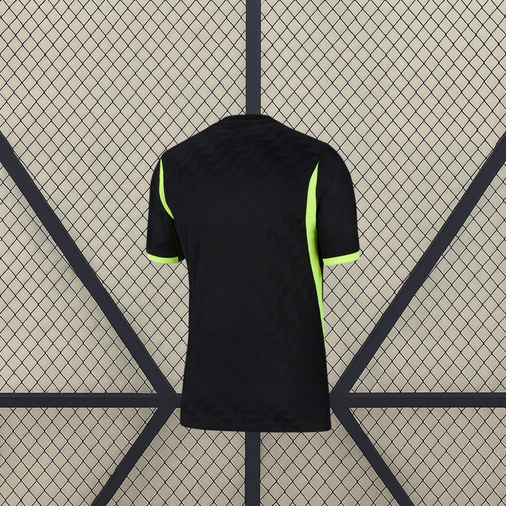 Camiseta Atlético de Madrid 25-26 Visitante vista trasera en negro con detalles verde lima