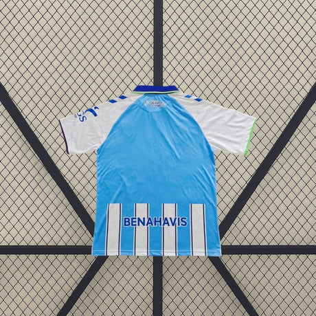 Camiseta Málaga 26-27 local vista trasera en azul celeste con detalles blancos