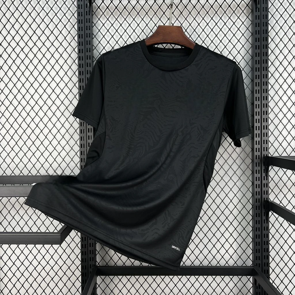 Camiseta Nueva Zelanda 26-27 visitante Mundial 2026 vista frontal en negro con patrón tonal