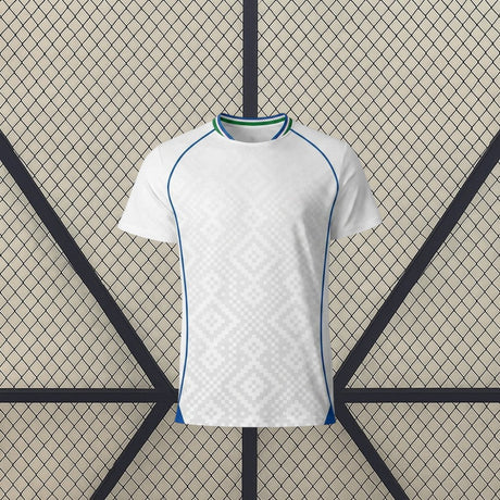 Camiseta Uzbekistán 26-27 visitante Mundial 2026 vista frontal en blanco con detalles azules
