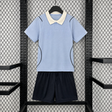 Equipación Uruguay niño 26-27 local Mundial 2026 con camiseta celeste y pantalón negro